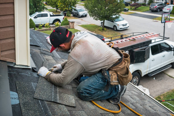 Professional Roofing technician working in Durham, OR